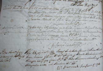 A dalt, document 7. Inscripció baptismal de Miquel Tur de Joan (= Miquel Tur i Pineda), fill de Joan Tur de Lluquí i de Margarida Pineda, la quarta generació de l'estirp (1720). Data 22 de setembre de 1720. La inscripció, que comença dient «Dit dia mes y any...», fa referència a la data de la inscripció anterior d'Isabet Arabí de Jordi, del 22 de setembre de 1720. Llibre de Baptismes de la parròquia de Santa Maria. AHPE (2.116). Transcripció: Dit dia mes y any (22 de setembre de 1720) batetgi yo de baix firmat a Miquel Matheu Geroni Silvestre Fill de Juan Tur de Lluqui y de Margarita Pineda de Miquel conjuges. Foren PP (padrins) Mosson Geroni llinas de Juan y Esperança Tur de Lluqui ad Laudem Dei etc. S. Fulgenci cambrils Pre. y V. Ct.