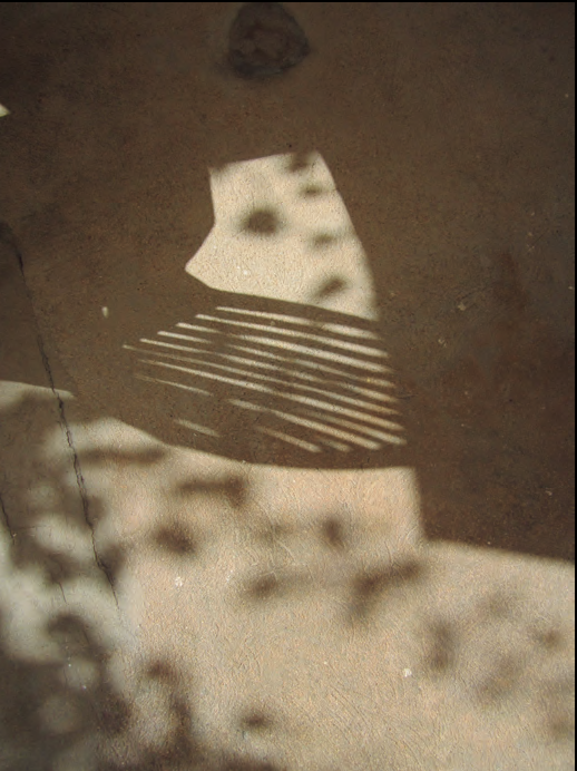Drawing or imprint on a sandy surface