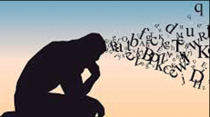 Image of a silhouette head with letters spilling out